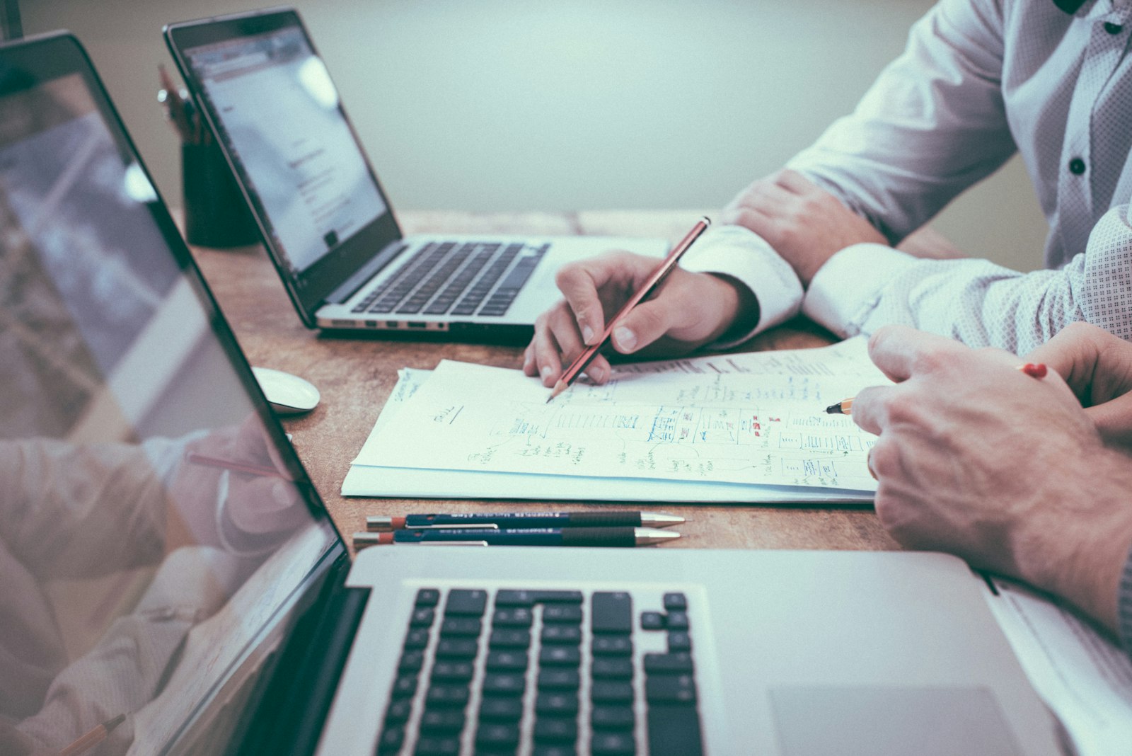 4Prime Group leadership in a strategy meeting